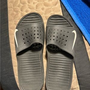 Nike black flip flops. Size 10.